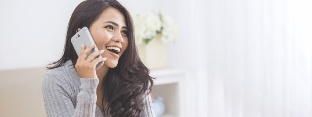 Woman smiling on the phone